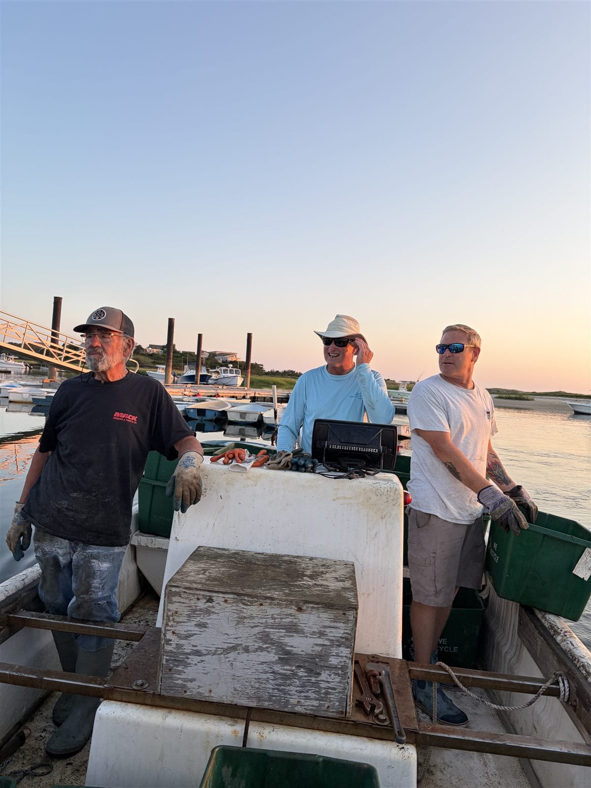 Three Friends of the Pamet River volunteers aboard a boat at Pamet Harbor during the August 2026 clam relay